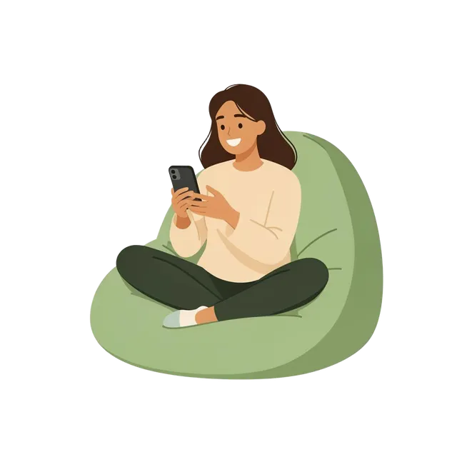 Person relaxing on bean bag browsing social media on phone